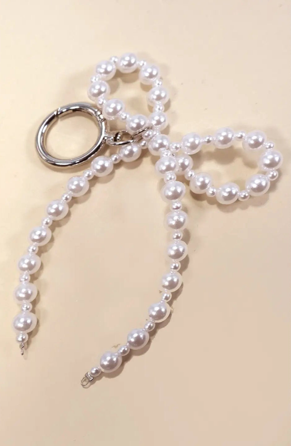 Pearl bow keychain with a metal clasp