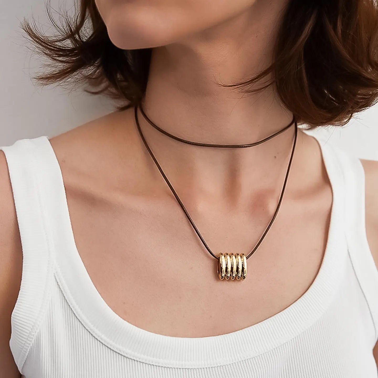 LEATHER CORD PENDANT