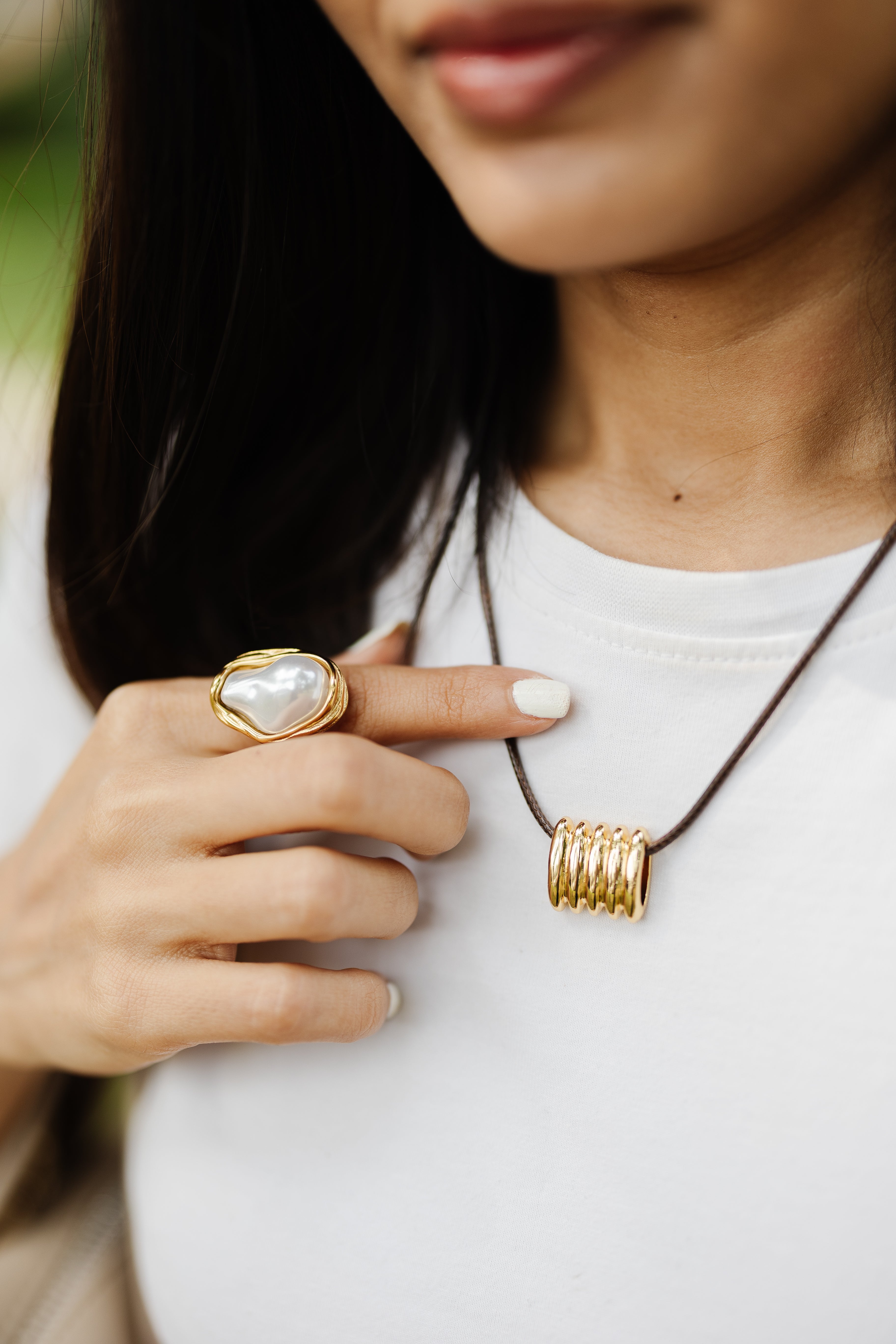 LEATHER CORD PENDANT