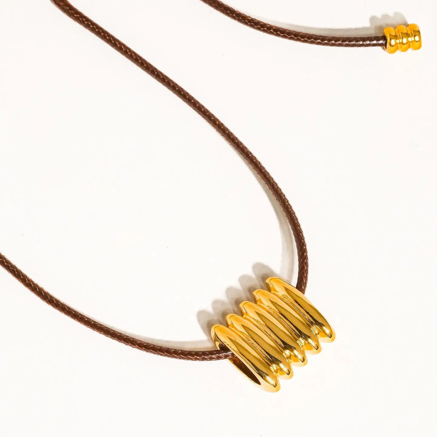 LEATHER CORD PENDANT