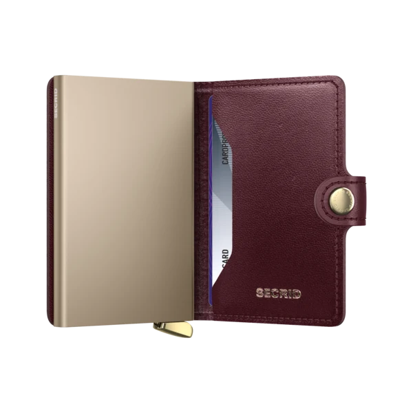 EMBOSSED DIAMOND MINI WALLET